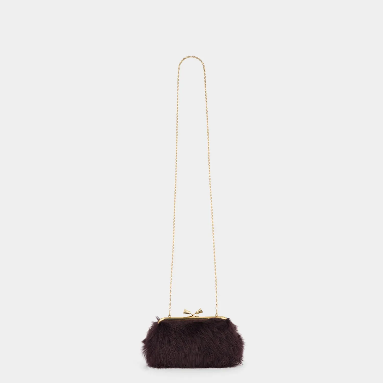 Maud Shearling Tassel Clutch