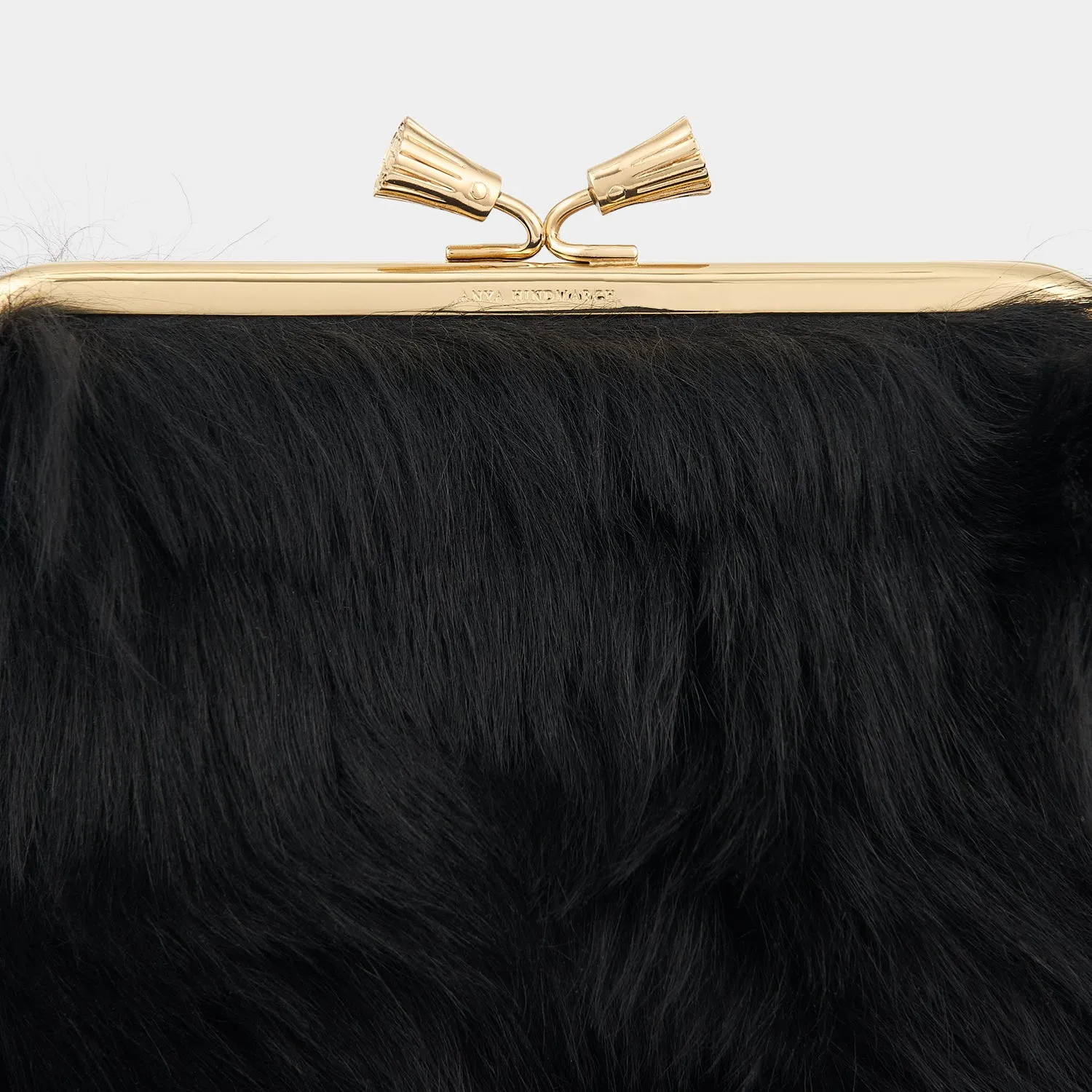 Maud Shearling Tassel Clutch